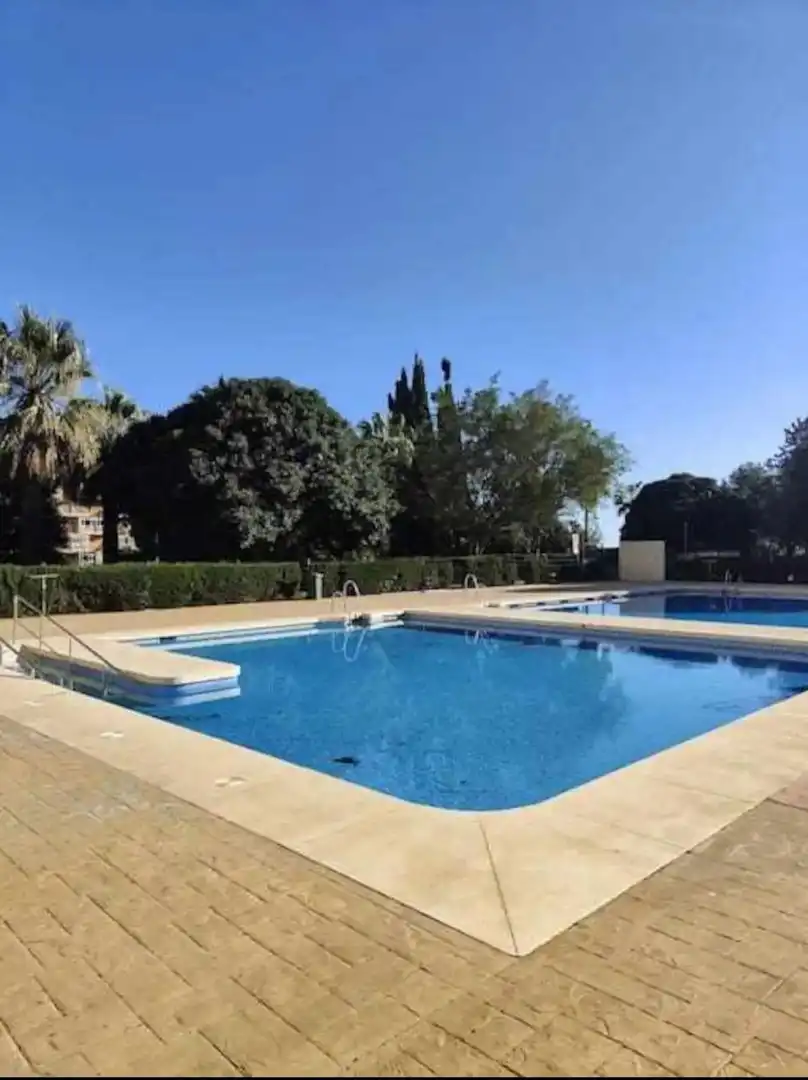 Piscina de Piso en venta en Benalmádena con Jardín privado, Terraza y Amueblado