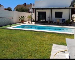 Piscina de Casa o xalet de lloguer en Palomares del Río amb Aire condicionat, Jardí privat i Terrassa