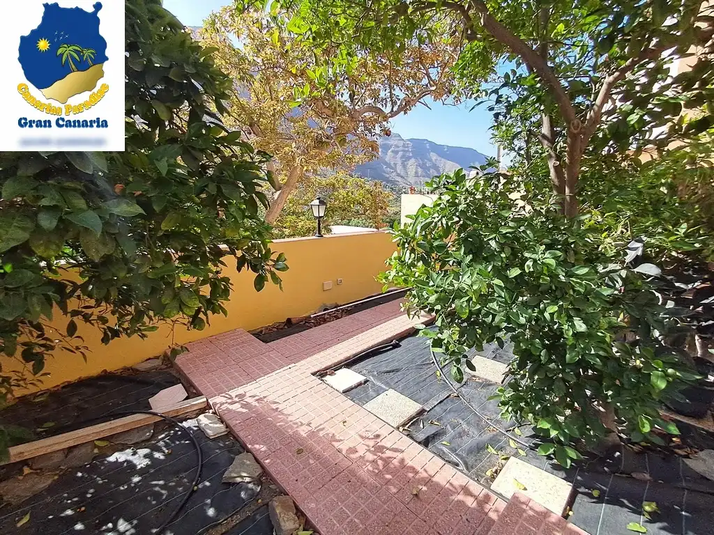 Außenansicht von Wohnung zum Verkauf in Mogán mit Privatgarten und Terrasse