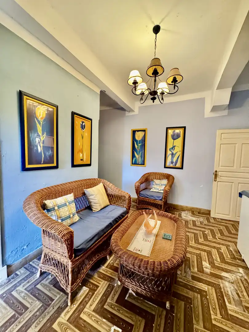 Sala de estar de Casa adosada en venta en Molledo con Parquet, Terraza y Amueblado