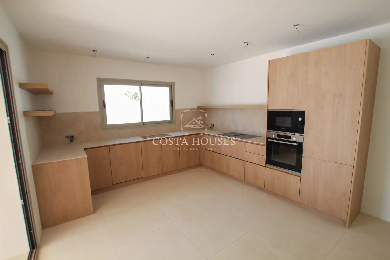 Cuina de Casa o xalet en venda en Moraira amb Aire condicionat, Jardí privat i Terrassa