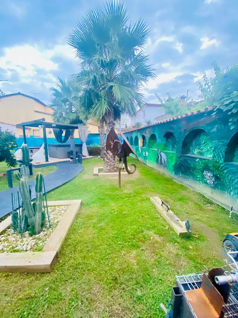 Jardí de Casa adosada en venda en Empuriabrava amb Aire condicionat, Calefacció i Jardí privat
