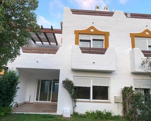 Exterior view of Single-family semi-detached for sale in Estepona  with Air Conditioner, Terrace and Swimming Pool