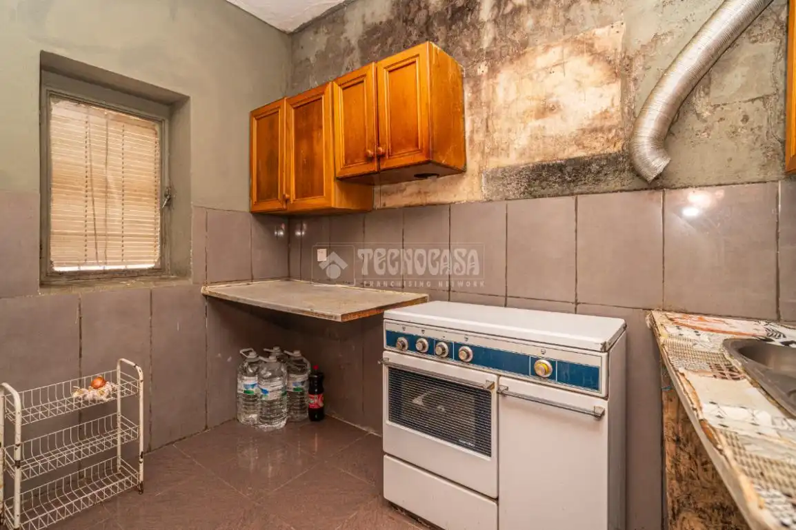 Cuina de Casa adosada en venda en Linares amb Aire condicionat i Terrassa