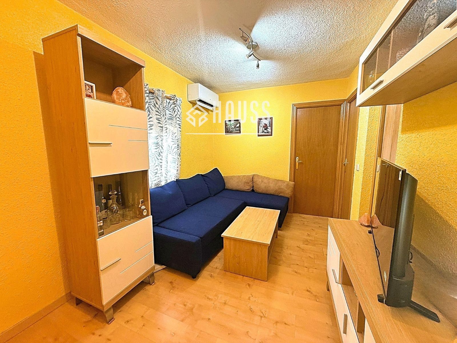 Sala d'estar de Pis en venda en  Madrid Capital amb Aire condicionat i Moblat