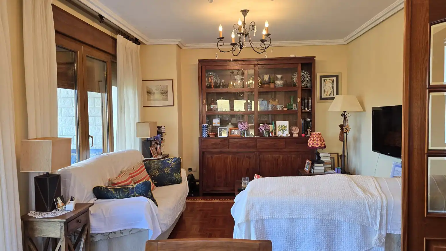 Sala d'estar de Casa adosada en venda en Suances amb Calefacció, Jardí privat i Parquet