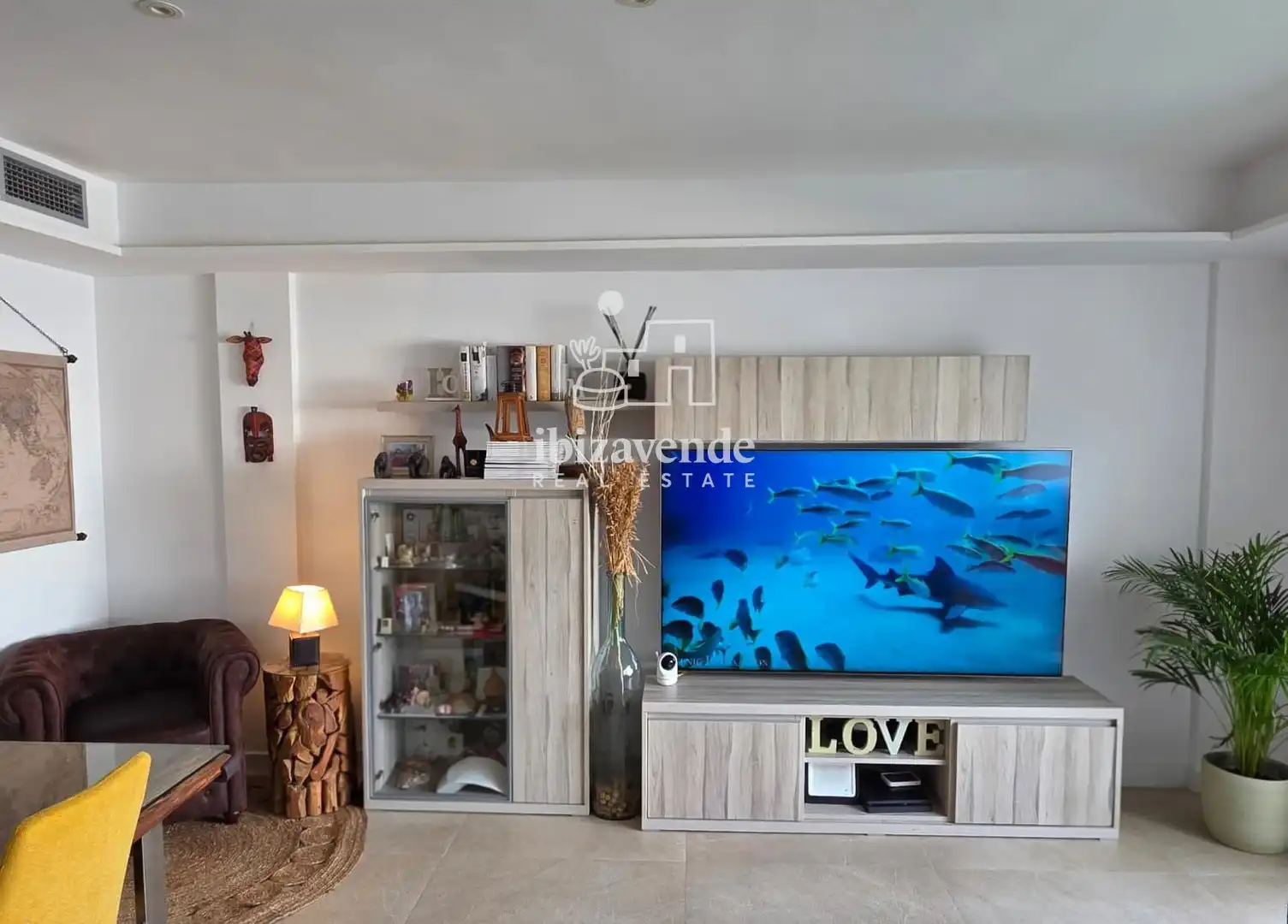 Sala de estar de Dúplex en venta en Santa Eulària des Riu con Aire acondicionado, Terraza y Piscina