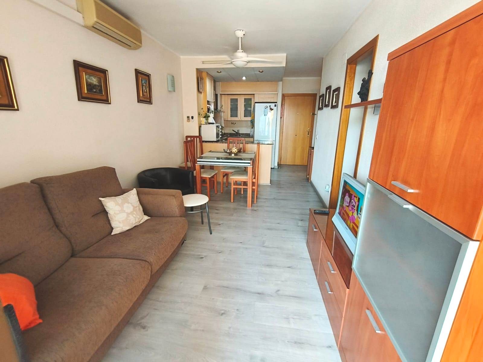 Living room of Flat for sale in Calella  with Air Conditioner, Heating and Parquet flooring