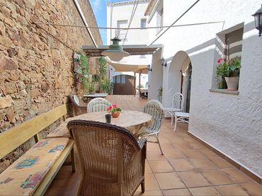 Casa rústica amb jardí en venda a Pals