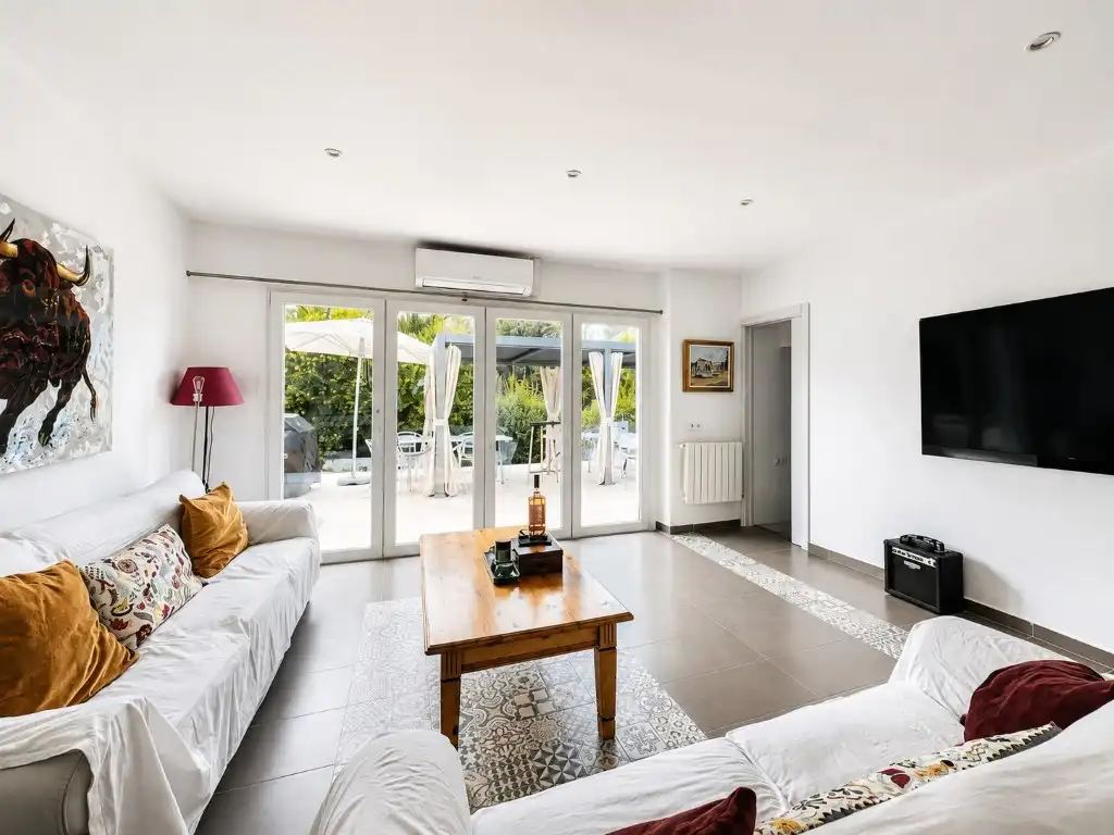 Sala d'estar de Casa o xalet de lloguer en Calvià amb Aire condicionat, Jardí privat i Terrassa
