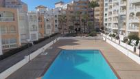 Swimming pool of Flat for sale in La Manga del Mar Menor  with Air Conditioner, Heating and Oven