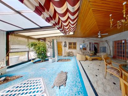 Swimming pool of House or chalet for sale in  Madrid Capital  with Air Conditioner, Terrace and Swimming Pool