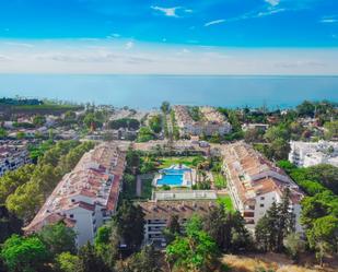 Exterior view of Planta baja for sale in Marbella  with Air Conditioner, Terrace and Swimming Pool