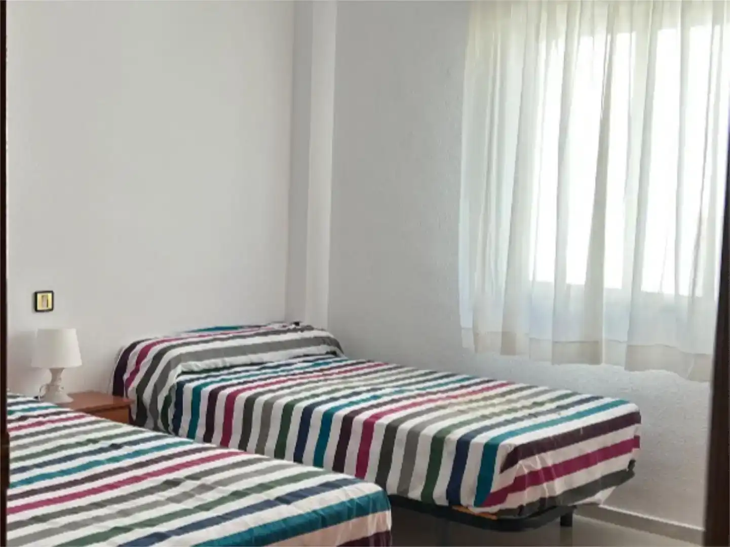 Dormitori de Casa adosada per a compartir en Mérida amb Aire condicionat i Moblat