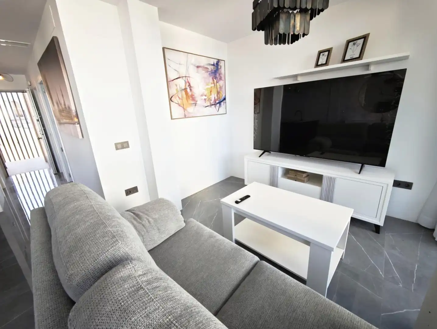 Sala d'estar de Apartament en venda en Benalmádena amb Aire condicionat, Terrassa i Traster