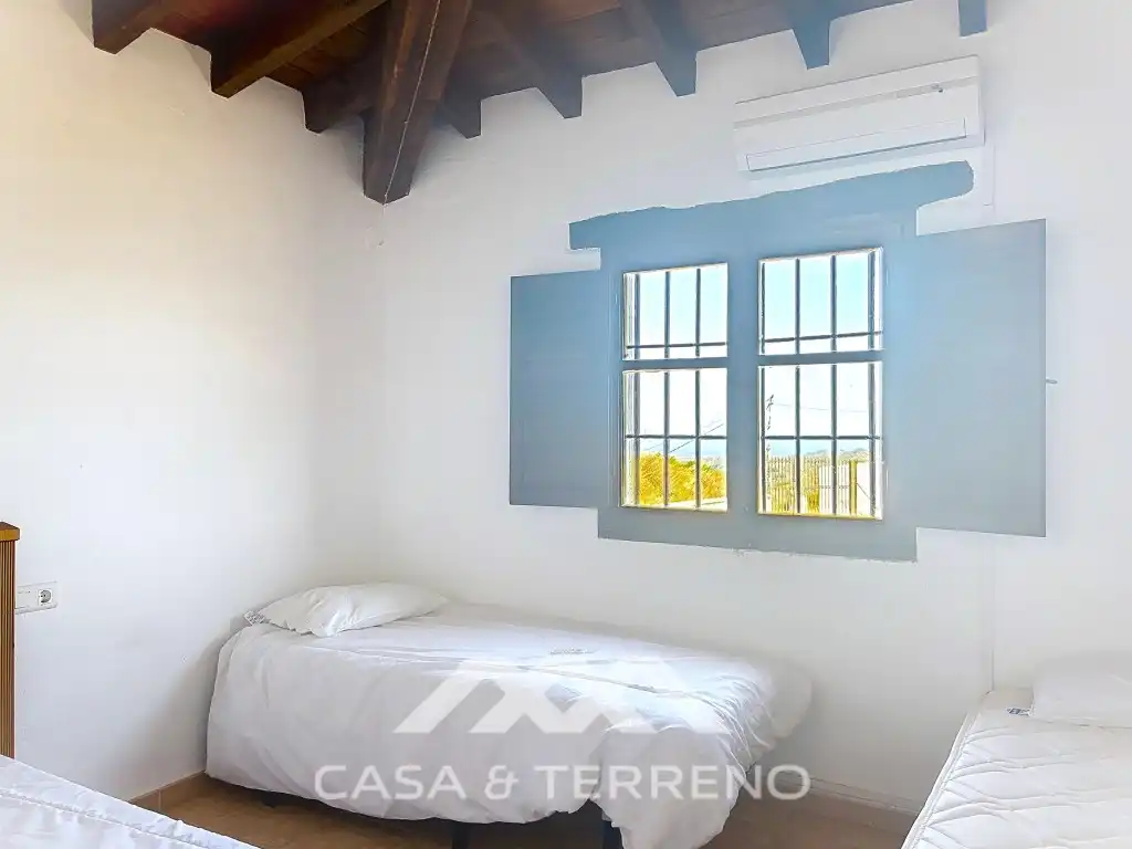 Dormitori de Casa o xalet de lloguer en Almáchar amb Aire condicionat, Terrassa i Rentadora