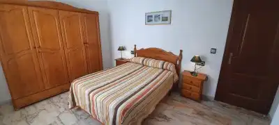 Dormitori de Apartament de lloguer en Córdoba amb Aire condicionat, Calefacció i Traster