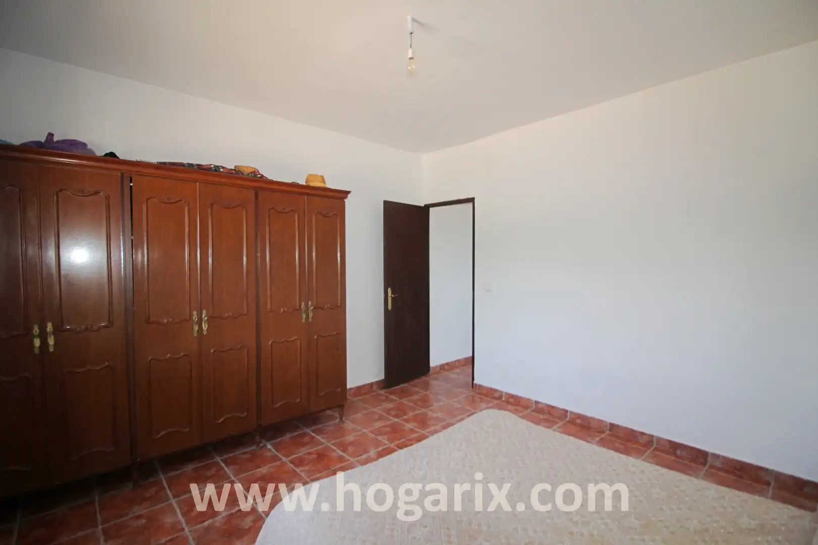 Schlafzimmer von Grundstücke zum Verkauf in Gibraleón