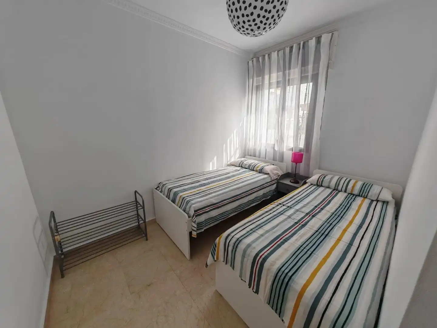 Habitación de Apartamento de alquiler en Sanlúcar de Barrameda con Aire acondicionado y Amueblado