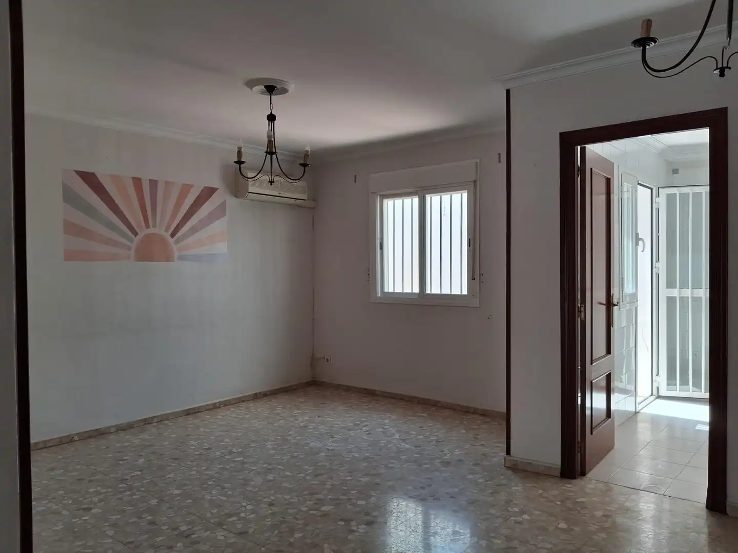 Sala d'estar de Casa adosada en venda en Utrera amb Piscina comunitària