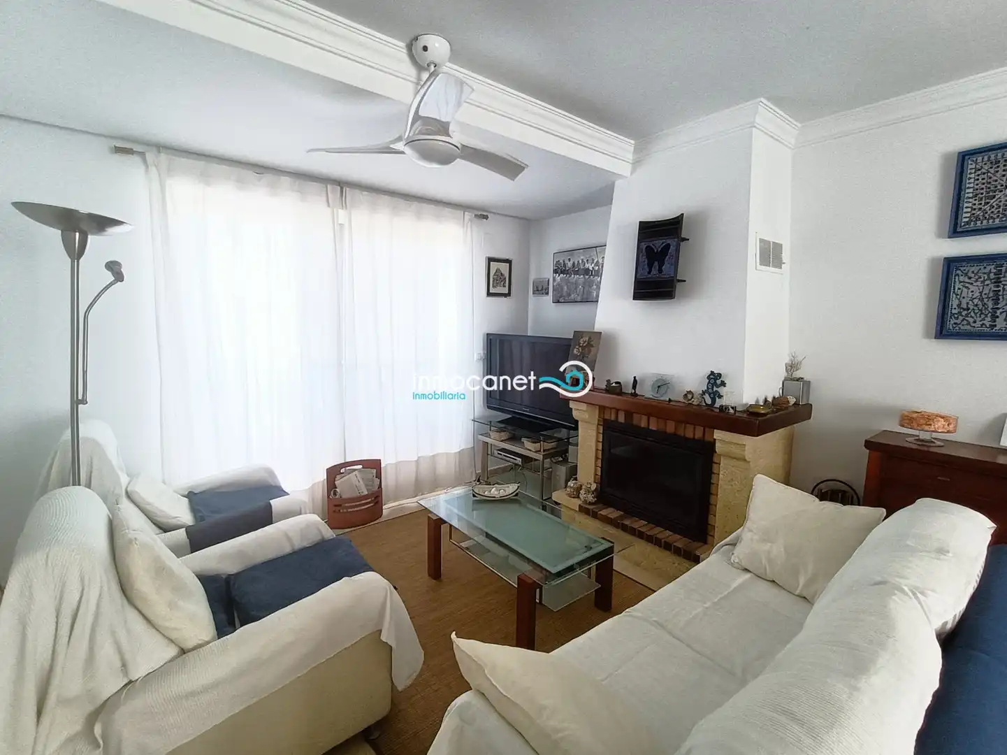 Sala de estar de Casa adosada en venta en Oliva con Aire acondicionado, Terraza y Piscina