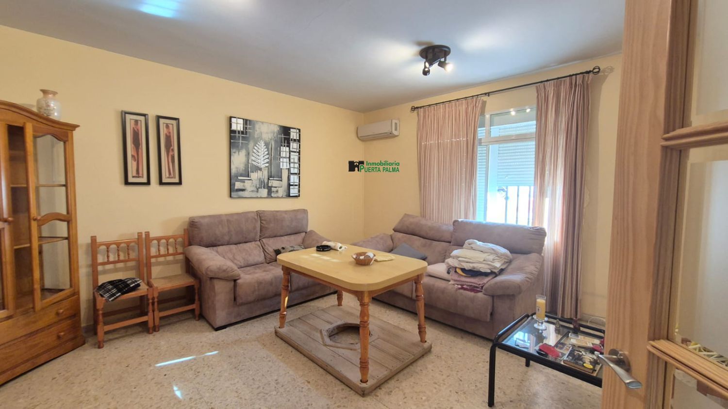 Sala d'estar de Casa adosada en venda en Talavera la Real amb Aire condicionat i Terrassa