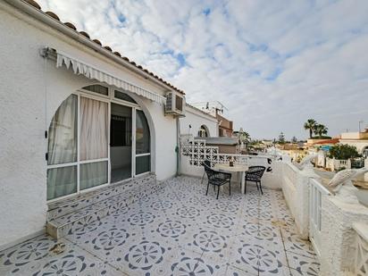 Terrace of House or chalet for sale in Torrevieja  with Air Conditioner, Heating and Private garden