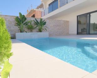 Piscina de Casa adosada en venda en Guardamar del Segura amb Terrassa i Piscina