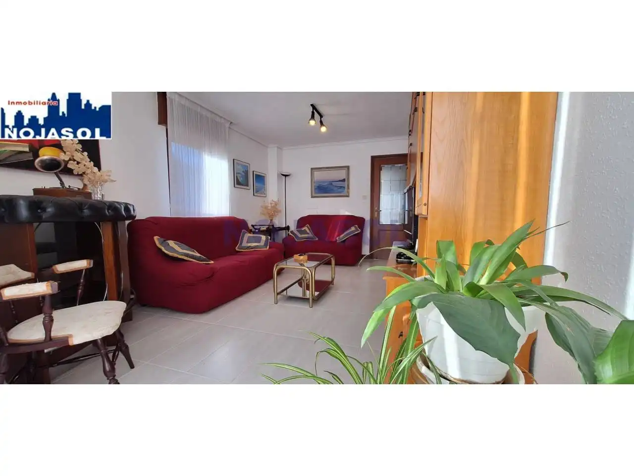 Sala d'estar de Dúplex de lloguer en Noja amb Calefacció, Terrassa i Moblat