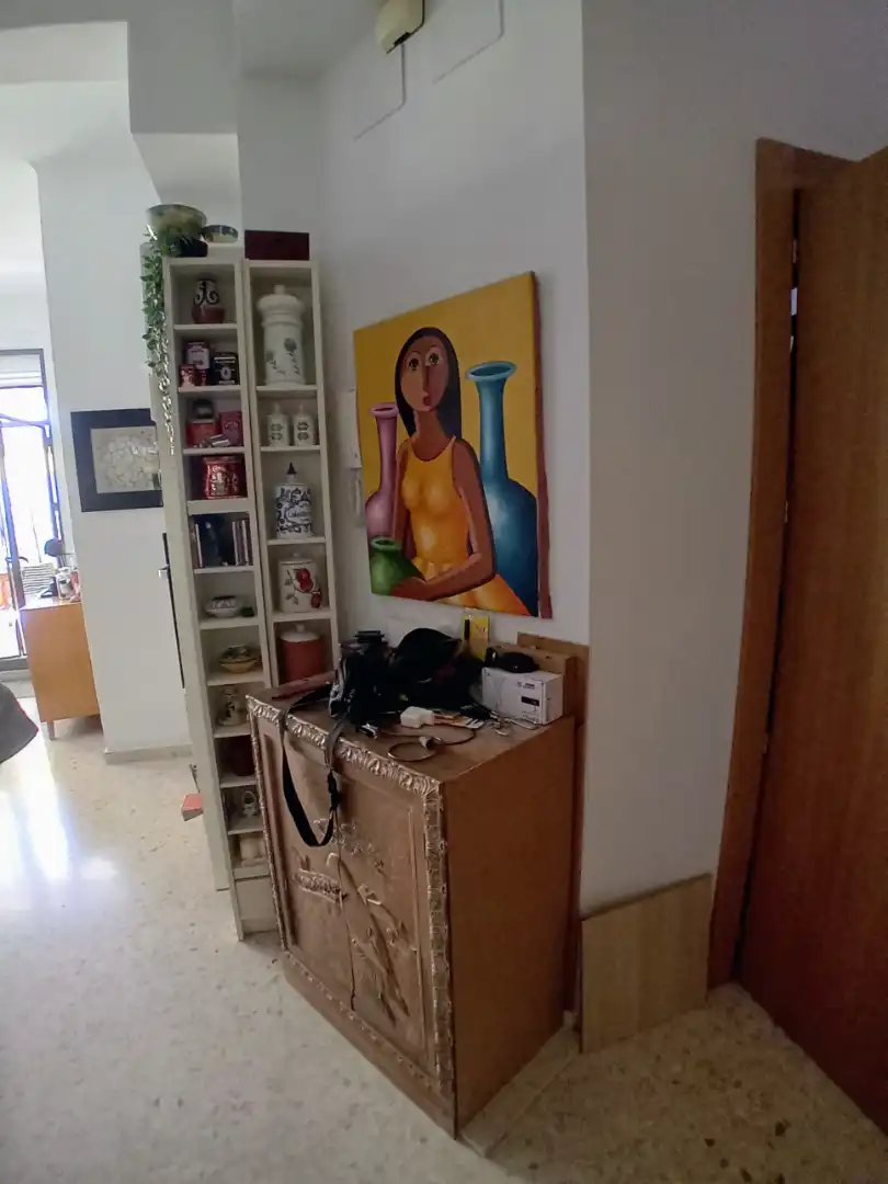 Sala d'estar de Casa adosada en venda en Málaga amb Piscina