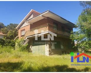 Vista exterior de Casa o xalet en venda en Santa María de la Alameda amb Jardí privat i Terrassa