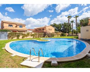 Piscina de Casa adosada en venda en Mont-roig del Camp amb Calefacció, Jardí privat i Terrassa