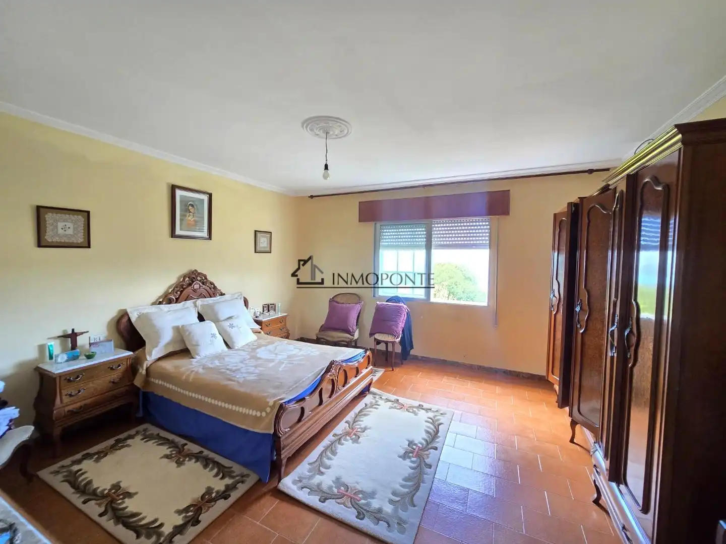Dormitori de Casa o xalet en venda en Pontevedra Capital  amb Jardí privat