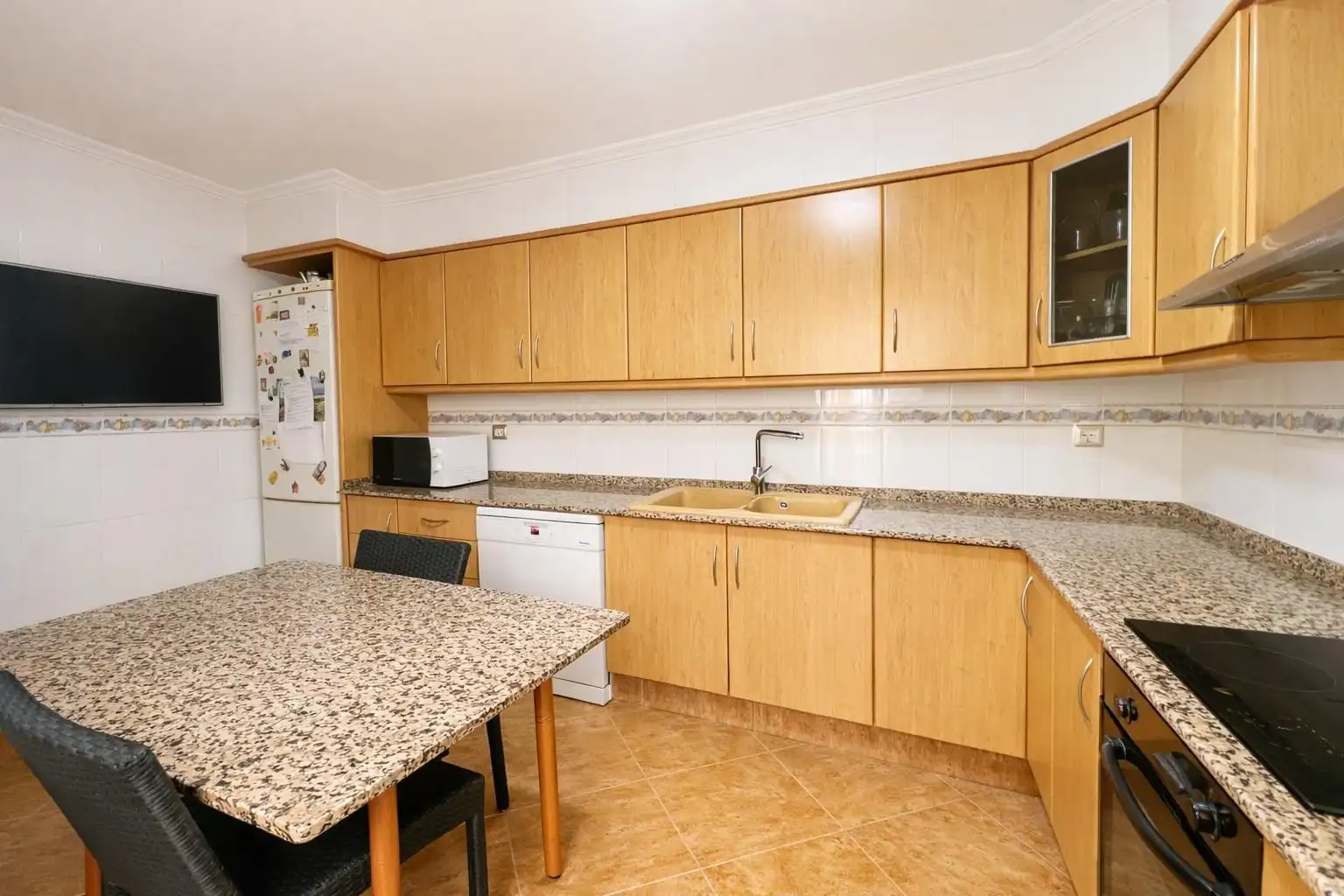 Cuina de Casa adosada en venda en Sagunto / Sagunt amb Aire condicionat, Calefacció i Terrassa