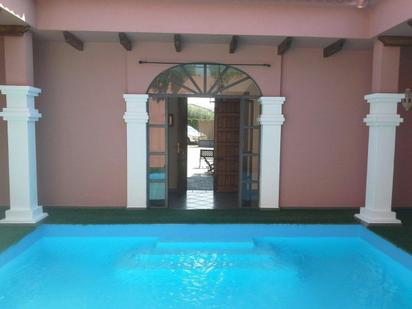 Swimming pool of House or chalet for sale in La Carlota  with Air Conditioner and Swimming Pool