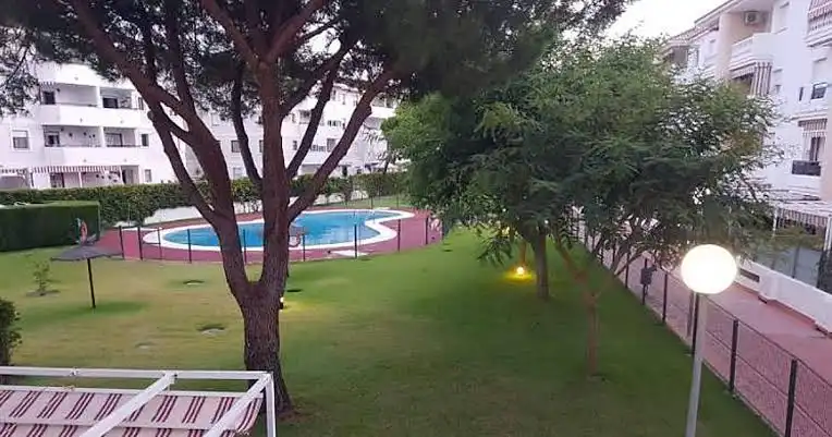 Piscina de Apartament en venda en El Portil amb Moblat i Piscina comunitària