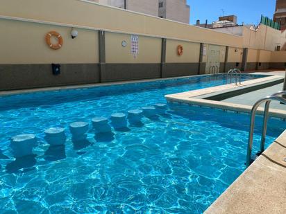 Swimming pool of Apartment for sale in Torrevieja  with Air Conditioner, Terrace and Balcony