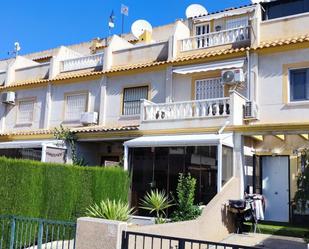 Exterior view of Single-family semi-detached for sale in Orihuela  with Private garden and Community pool
