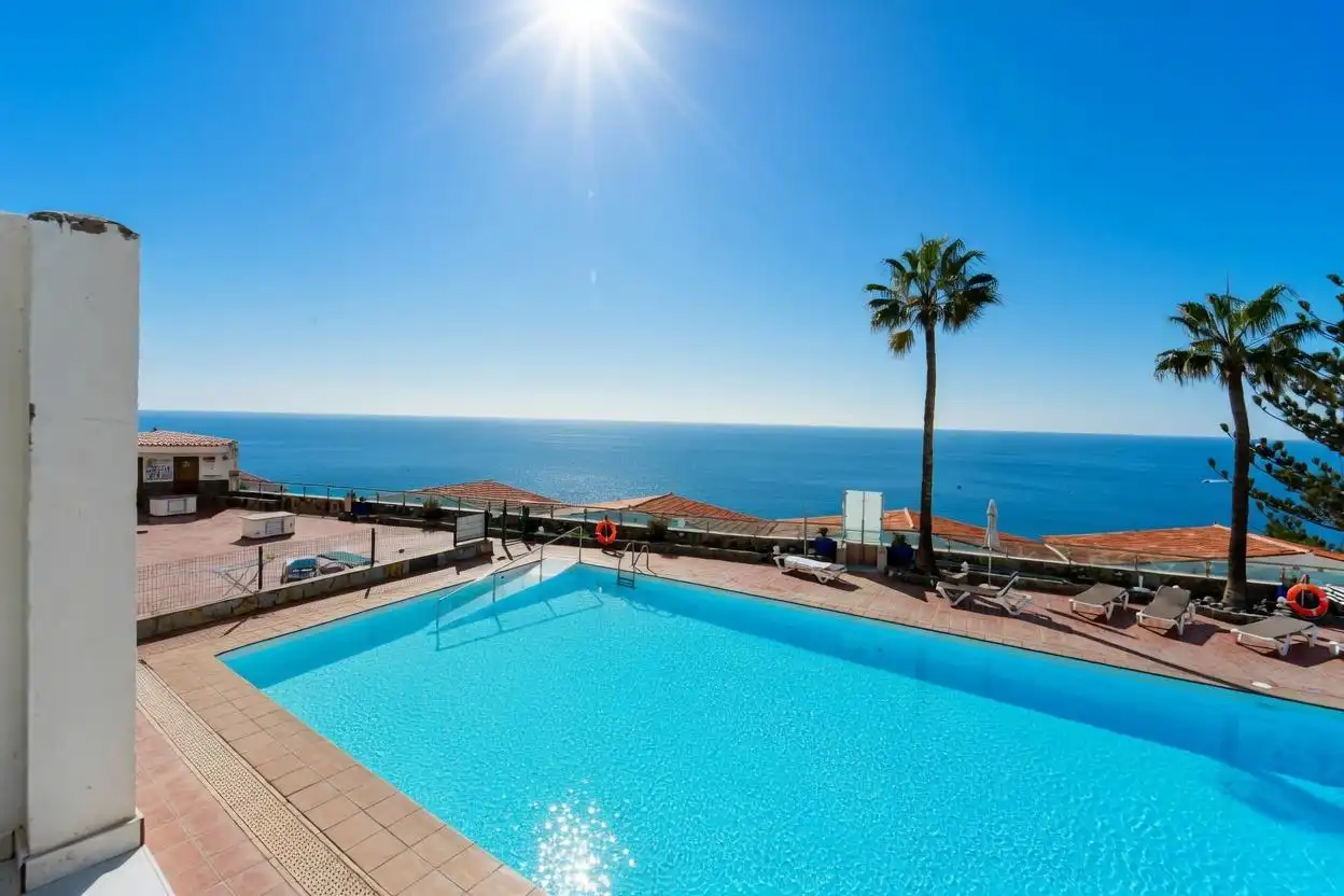 Piscina de Apartamento en venta en Mogán con Aire acondicionado, Jardín privado y Terraza