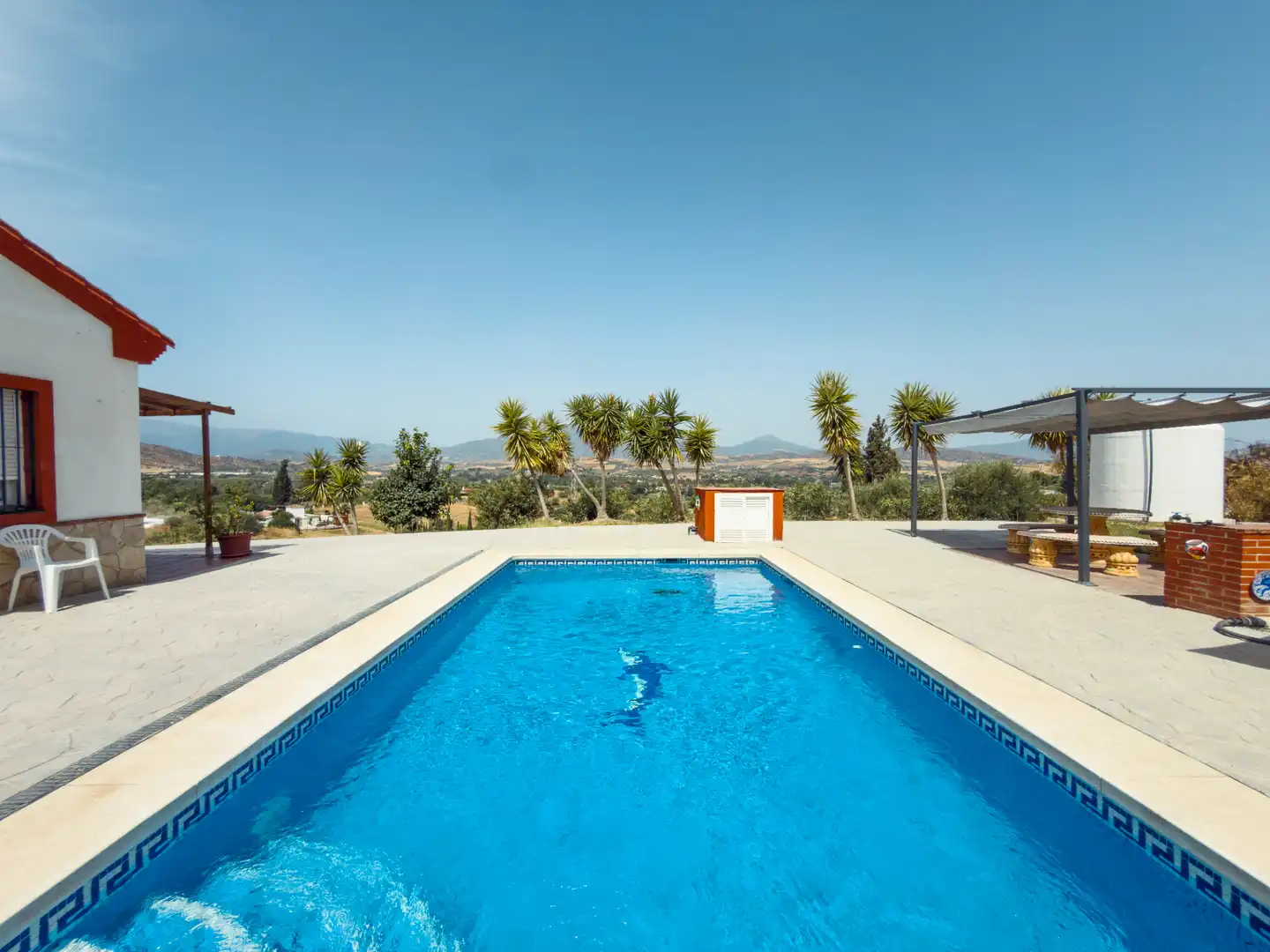 Casa rústica amb piscina en venda a Coín