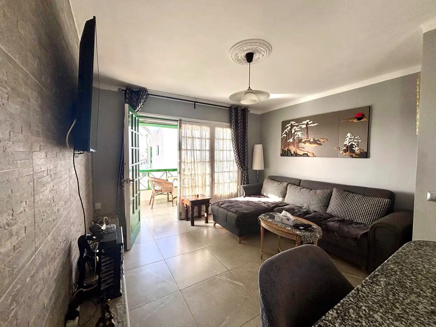 Sala de estar de Apartamento en venta en Tías con Terraza, Amueblado y Piscina comunitaria