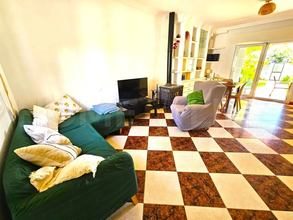 Sala d'estar de Casa adosada en venda en Benalmádena amb Terrassa i Moblat