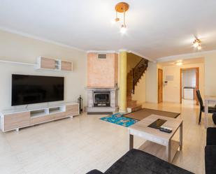 Sala d'estar de Casa adosada en venda en Xeraco amb Aire condicionat, Terrassa i Balcó