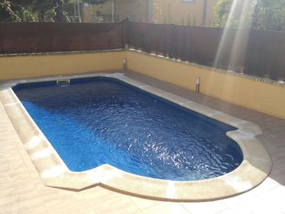 Swimming pool of House or chalet for sale in Isla Cristina  with Air Conditioner, Heating and Private garden