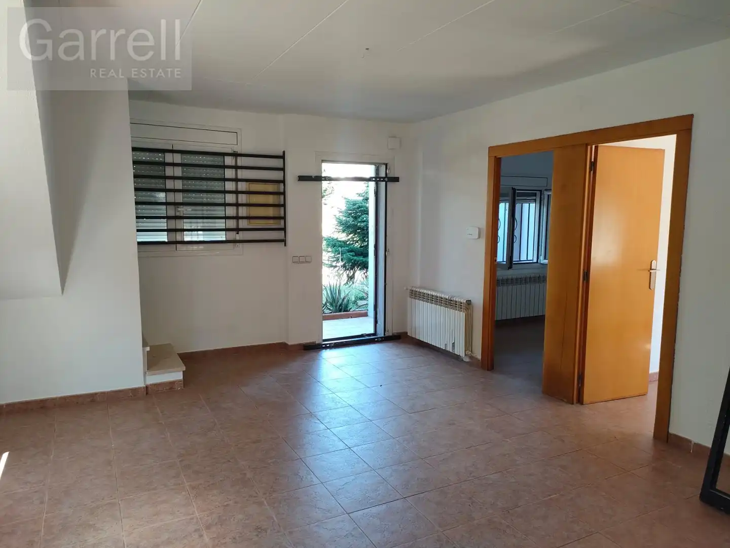 Sala d'estar de Casa adosada en venda en Llagostera amb Terrassa i Piscina