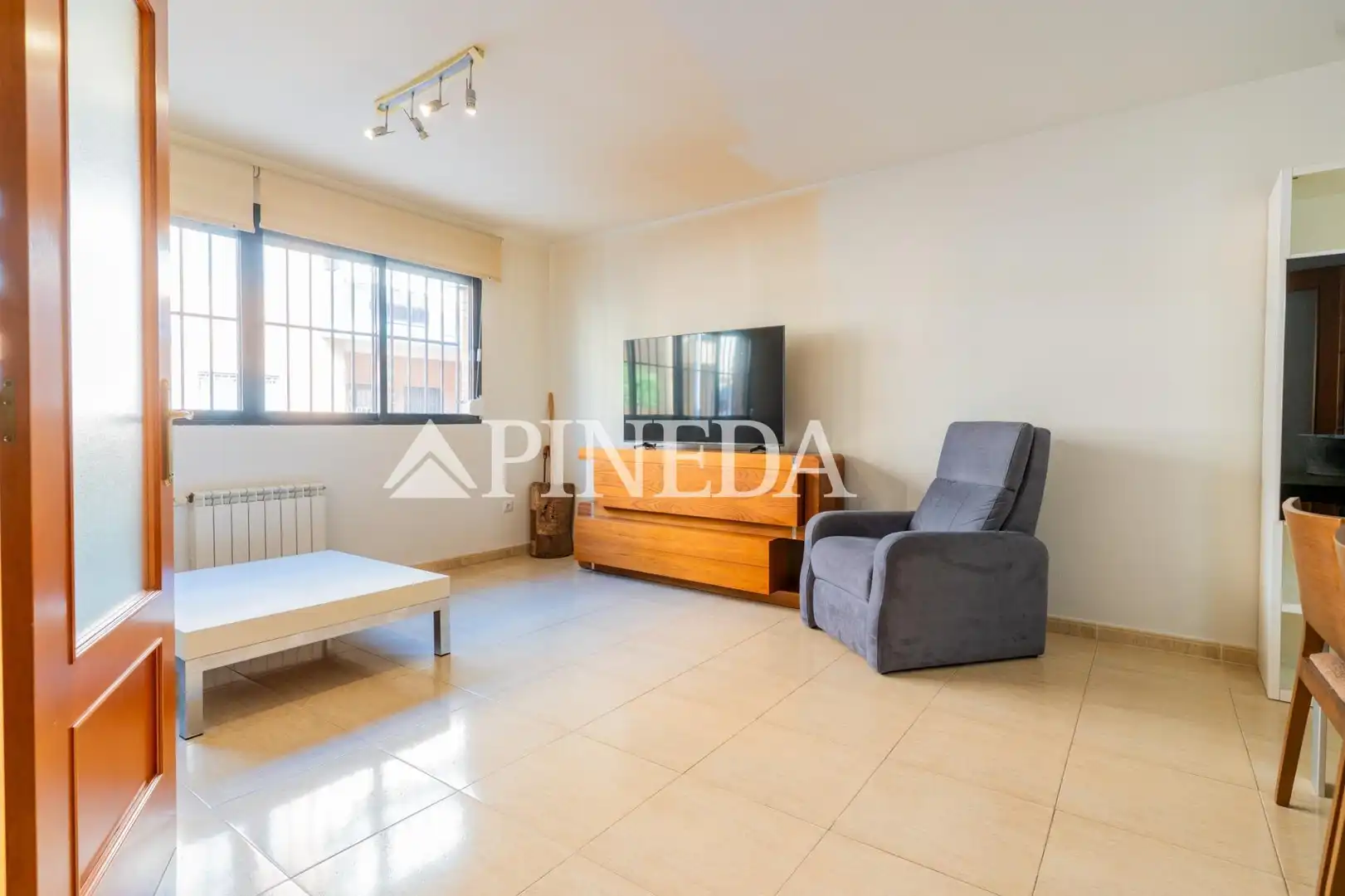 Sala de estar de Casa adosada en venta en Puçol con Calefacción, Terraza y Trastero