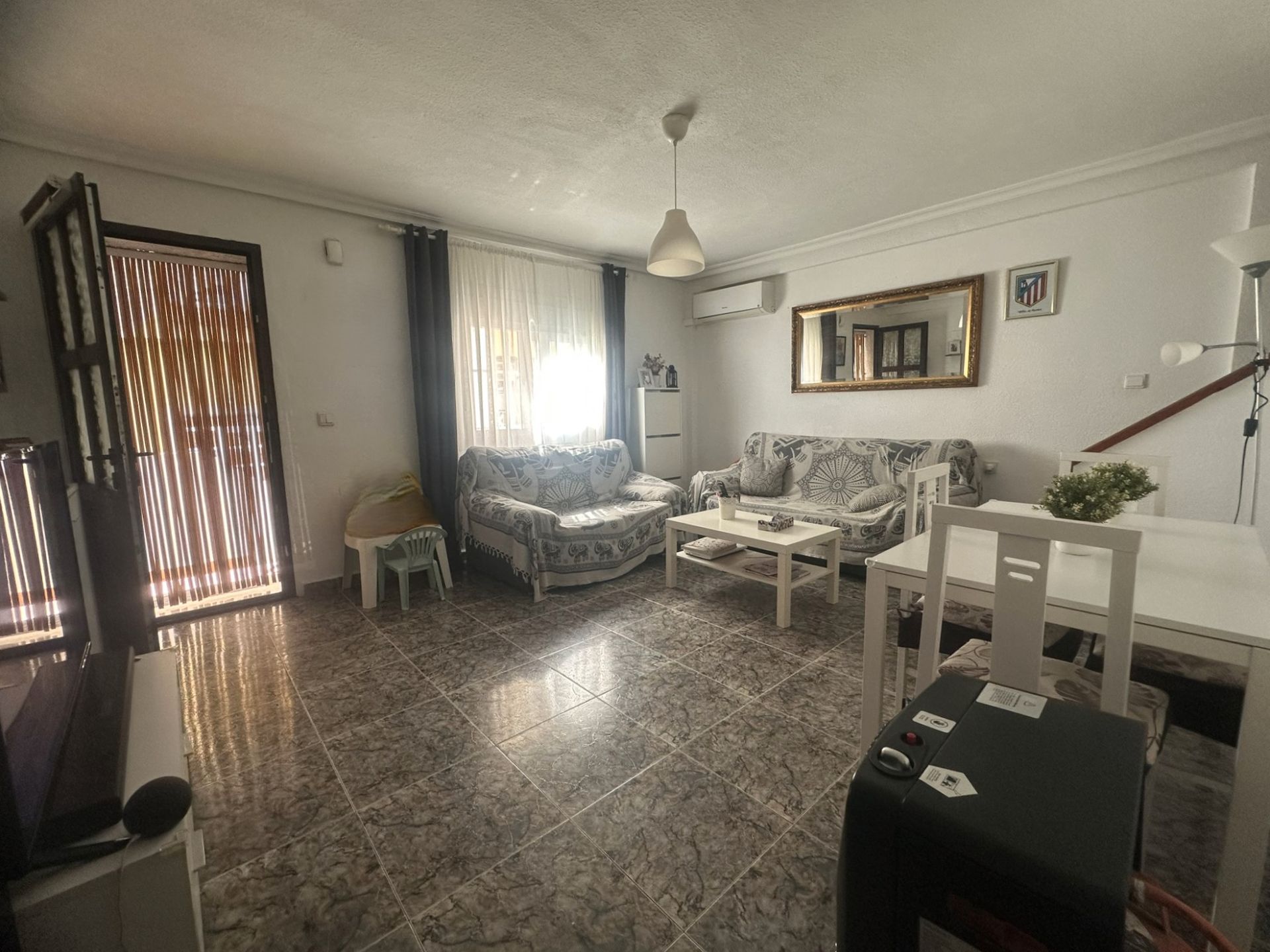 Sala d'estar de Casa adosada en venda en Los Alcázares amb Aire condicionat, Jardí privat i Terrassa