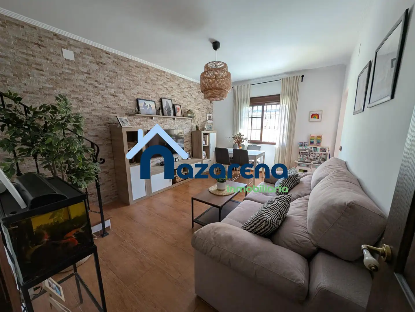 Sala de estar de Casa adosada en venta en Dos Hermanas con Aire acondicionado