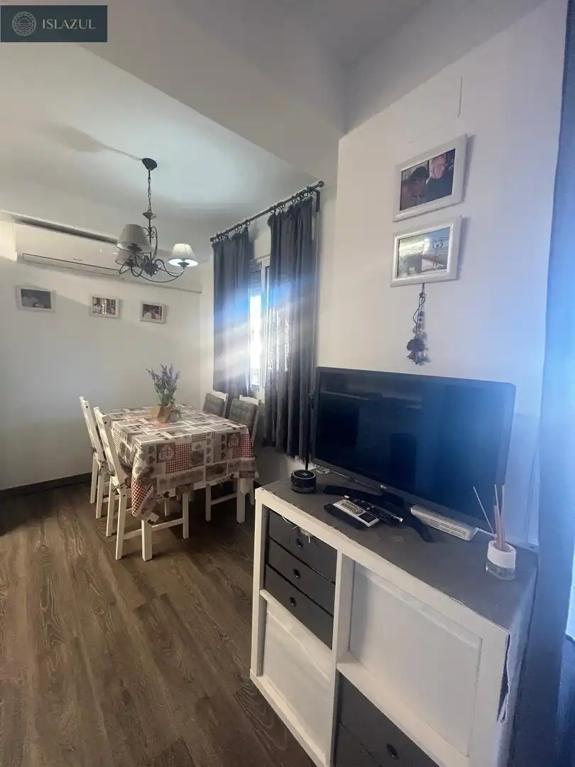 Menjador de Apartament en venda en Isla Cristina amb Aire condicionat, Jardí privat i Terrassa