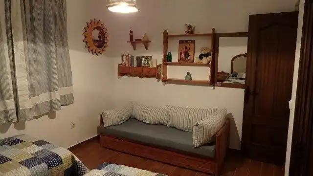 Sala d'estar de Casa o xalet en venda en Chiclana de la Frontera amb Jardí privat i Piscina comunitària